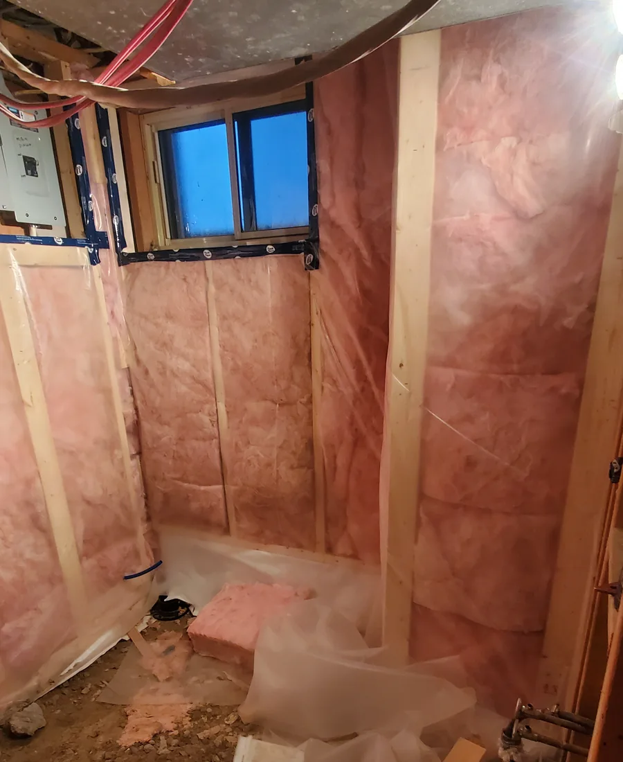 Renovation framing and insulation work in progress